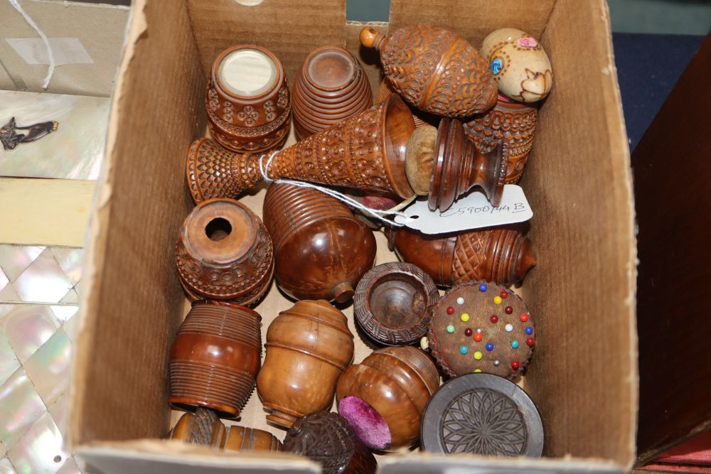 A group of 19th century coquilla nut sewing, games related etc barrel, basket and acorn shaped containers